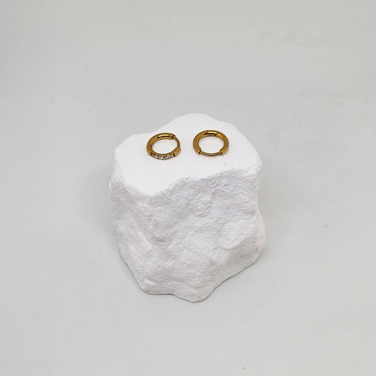 Gold hoop earrings with cubic zirconias
