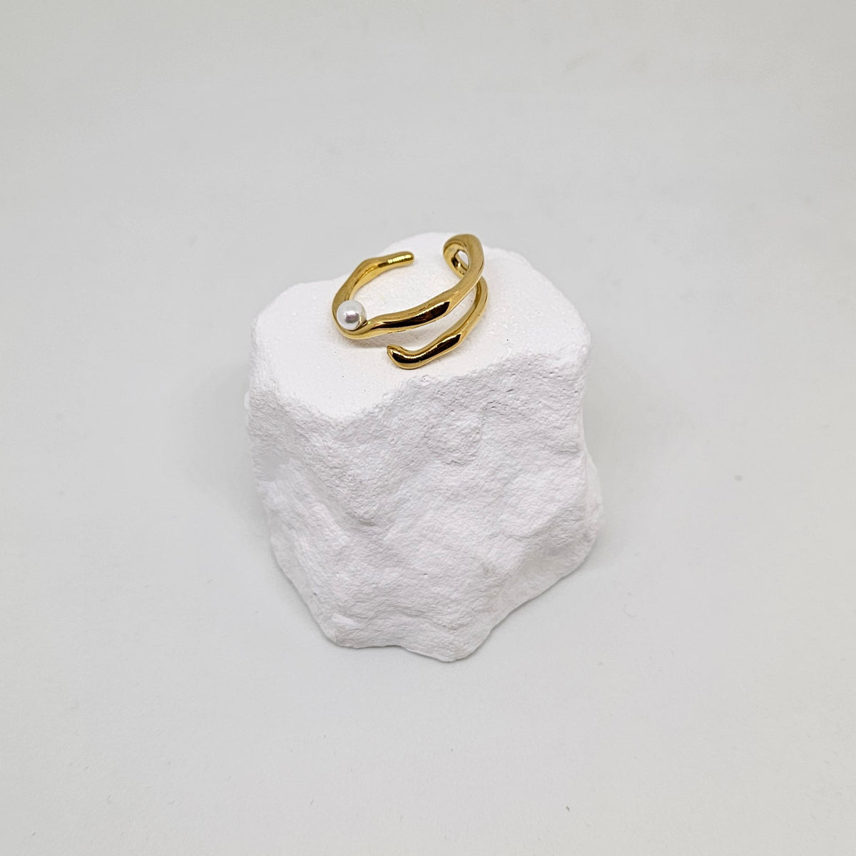 Gold statement ring with a pearl photo